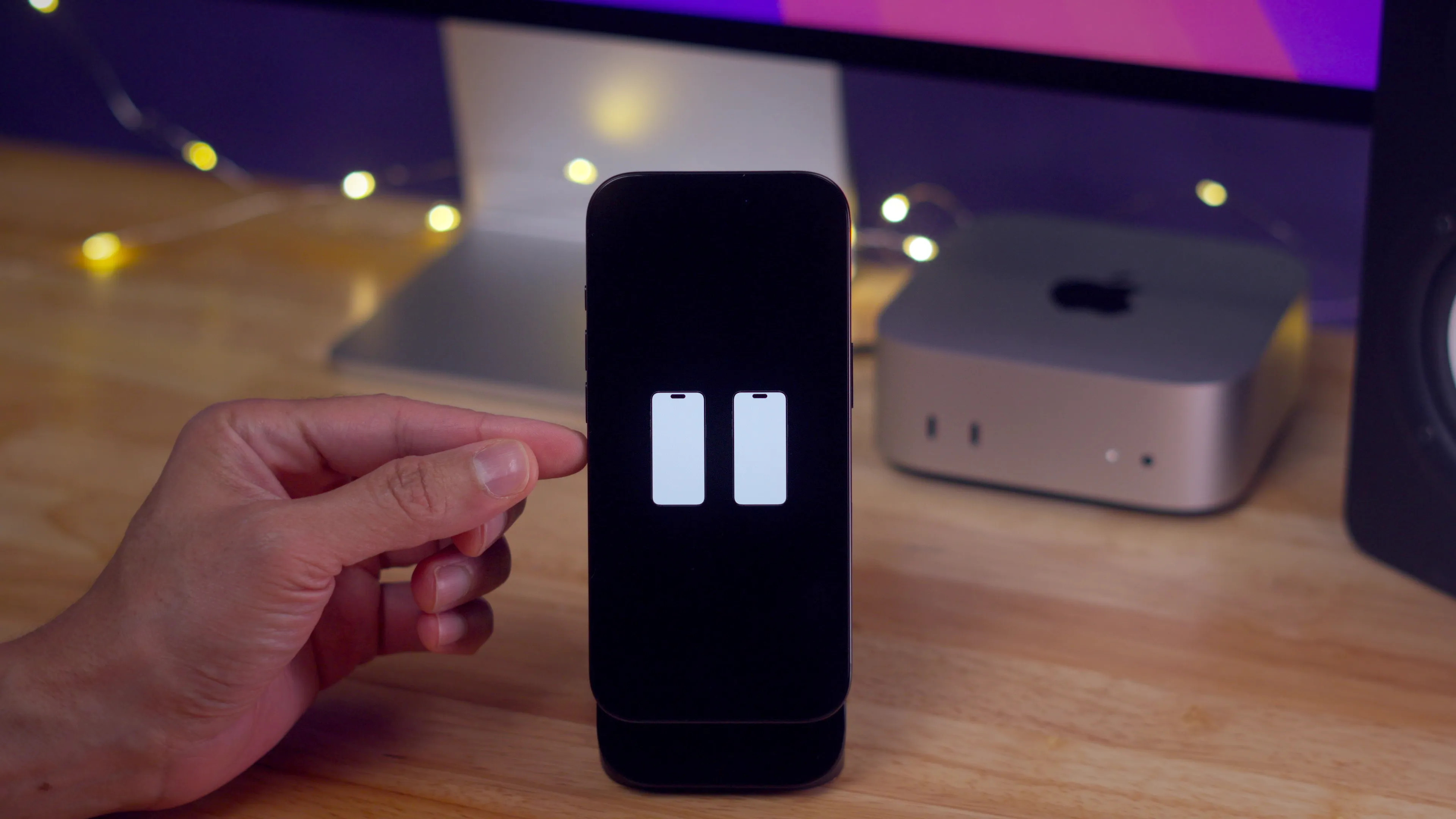 Animation zur drahtlosen Wiederherstellung auf dem iPhone 16 Display